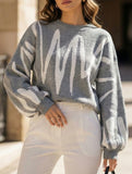 Casual wavy lantern off-shoulder knit top