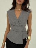 Solid color sleeveless fitted waist pullover top
