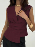 Solid color sleeveless fitted waist pullover top