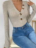 Solid color long-sleeved striped V-neck jumpsuit