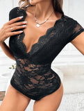 Fitted bodysuit with lace trim and ruffled collar