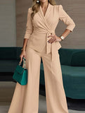 Fashionable belted jacket and trouser suit for women