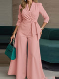 Fashionable belted jacket and trouser suit for women
