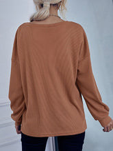 Long-sleeved base layer button-down sweater