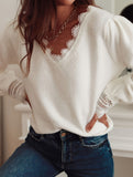 Solid color knitted hollow long-sleeved top