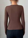 Asymmetric cutout slim-fit top
