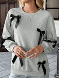 Grey bow-decorated crew neck sweatshirt