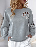 Hollow flower pattern round neck long sleeves