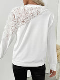Rose embellished long-sleeved solid color sweatshirt