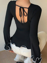 Color-blocked ruffled knit sweater