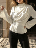 Waist-cinching long-sleeved slit shirt