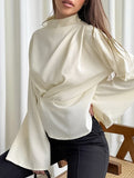 Waist-cinching long-sleeved slit shirt
