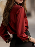 Leopard print crew neck spliced satin shirt