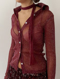 Women's long-sleeved cardigan with subtle shimmer