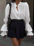 Women's casual blouse with elegant bell sleeves