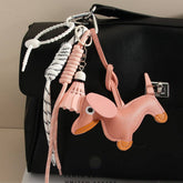 CUTE LEATHER DACHSHUND BAG CHARM WITH SHUTTLECOCK_CWMM7565