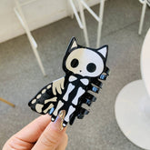 GLOW SKULL PUMPKIN ACETATE HAIR CLAW 8 3CM CLIP_CWASC1590