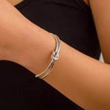 SIMPLE DOUBLE LAYER HOLLOW KNOTTED OPEN BRACELET_CWMM3101