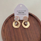 ADVANCED SHELL ROUND PENDANT EARRINGS_CWAJE1354