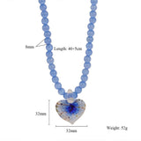 CAT S EYE GLASS HEART FLOWER PENDANT NECKLACE_CWMM7536