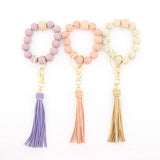 LEOPARD WOOD BEAD BRACELET KEYCHAIN WITH TASSEL_CWMM7016