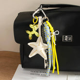 STARFISH BALLOON DOG KEYCHAIN WITH TASSEL_CWMM7567