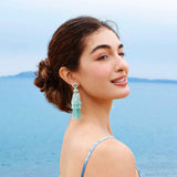 MINT MAMBO STYLE TRANSPARENT TASSEL EARRINGS_CWAJE1661