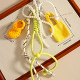 MINI HEADPHONE CASE KEYCHAIN BOW BAG CHARM_CWMM7871