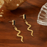 18K GOLD SNAKE SHAPED EARRINGS WITH DIAMONDS_CWMM3650