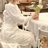 LINES COTTON AND LINEN PRINTED RUFFLED FLORAL APRON_CWMM5816