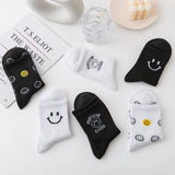 CARTOON BLACK AND WHITE SMILING FACE WOMENS SOCKS_CWMS1415