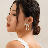 BOW FRENCH TASSEL PEARL EARRINGS_CWAJE1156