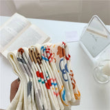 MILKY WHITE DOODLE SMILEY PATTERN CREW SOCKS_CWMS0208