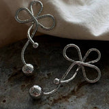 GEOMETRIC TWISTED FLOWER PEARL TASSEL BOW EARRINGS_CWAJE3005