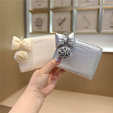 Textured Bow Pendant Bifold Wallet_Cwab06235