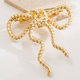 BOUTIQUE METAL RHINESTONE BOW ELASTIC HAIR TIE_CWAHA6180