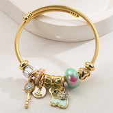 PERSONALIZED ELEPHANT CHARM TITANIUM BRACELET_CWMM8607