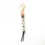 SILICONE BEAD KEYCHAIN WITH LETTER AND WOODEN DISC_CWAB5106