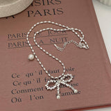 Womens Pearl And Silver Bow Pendant Necklace
