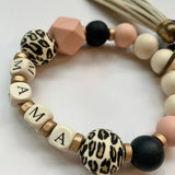 MAMA LETTER LEOPARD BEAD BRACELET WITH TASSELS_CWAJE1064