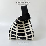 BLACK AND WHITE STRIPED STITCH HANDBAG_CWAB2393
