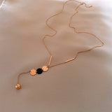 GEOMETRIC SEQUIN TASSEL NECKLACE_CWAJE2370