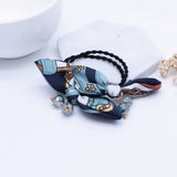 SIMPLE PEARL BOW HAIR TIE_CWAHA1074