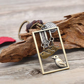 ALLOY BIRD PENDANT WOVEN LEATHER KEYCHAIN_CWMM5038