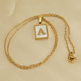 SQUARE SHELL 26 LETTER PENDANT NECKLACE_CWAJE0674