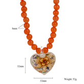 CAT S EYE GLASS HEART FLOWER PENDANT NECKLACE_CWMM7536