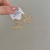 SIMPLE NICHE HOLLOW BUTTERFLY EARRINGS_CWAJE1292