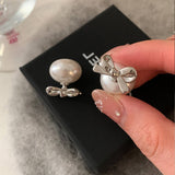 TEMPERAMENTAL AND HIGH END BOW PEARL EARRINGS_CWAJE2971