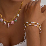 CLASSIC 18K GOLD BAMBOO PINK ENAMEL OPEN BANGLE_CWAJE4742