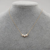 SMALL TEMPERAMENT PEARL CLAVICLE NECKLACE_CWAJE1669